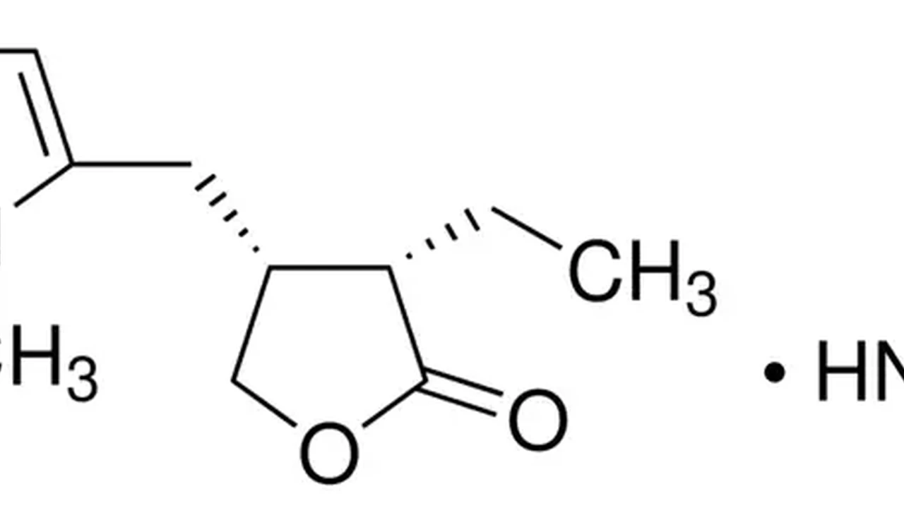 overhead view of corned beef sliced and on a platter with cabbage, potatoes, and carrots