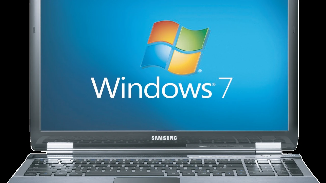 blue bowl of black bean beef tortilla soup on a board with cilantro and shredded cheese in background