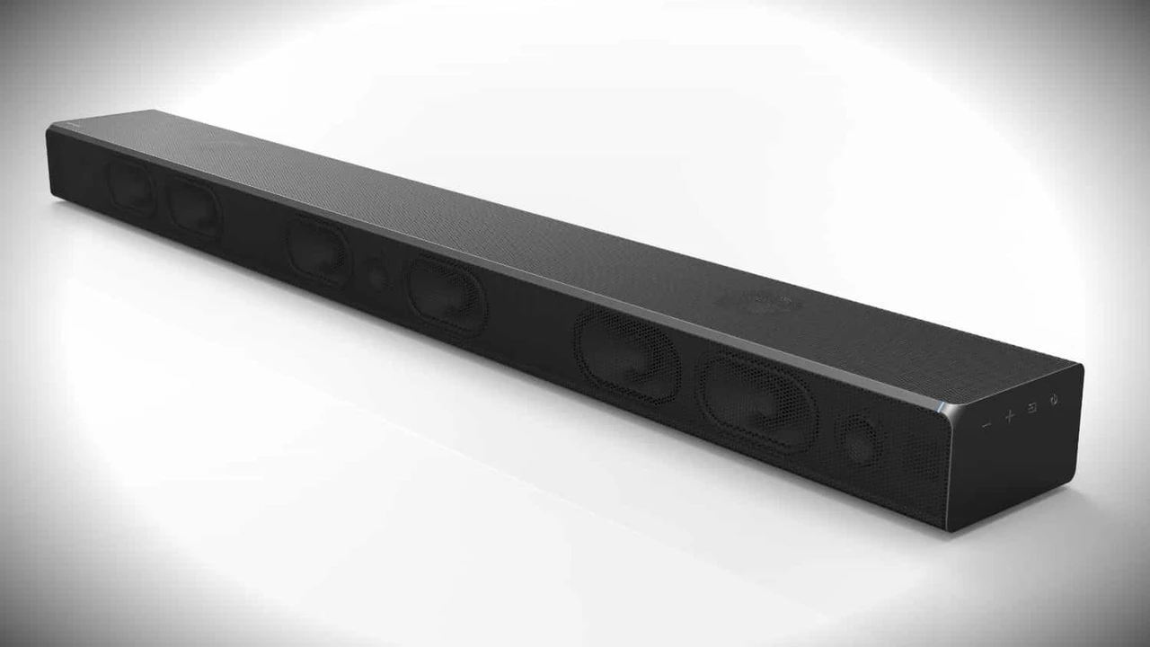 Close up on a plate of mashed potatoes, topped with baked pork chops with cream of mushroom soup, and a side of green beans.