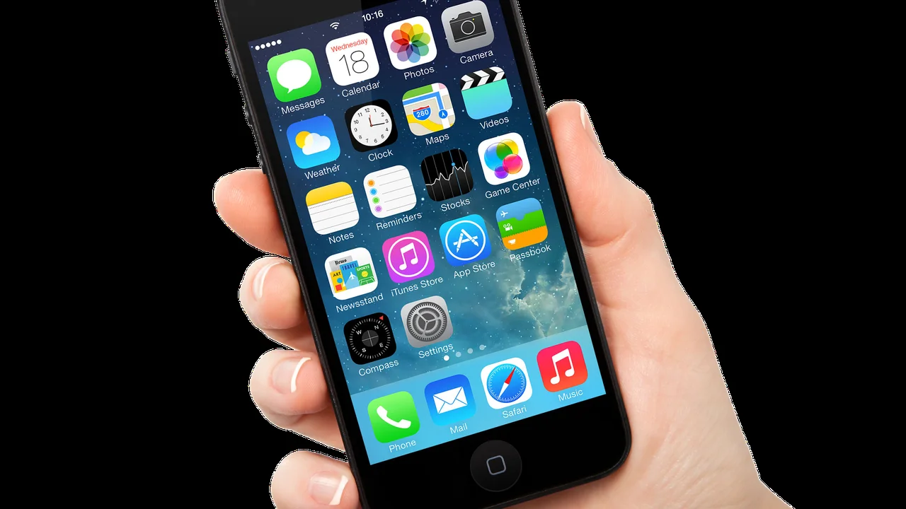 Close up on a plate of mashed potatoes, topped with baked pork chops with cream of mushroom soup, and a side of green beans.