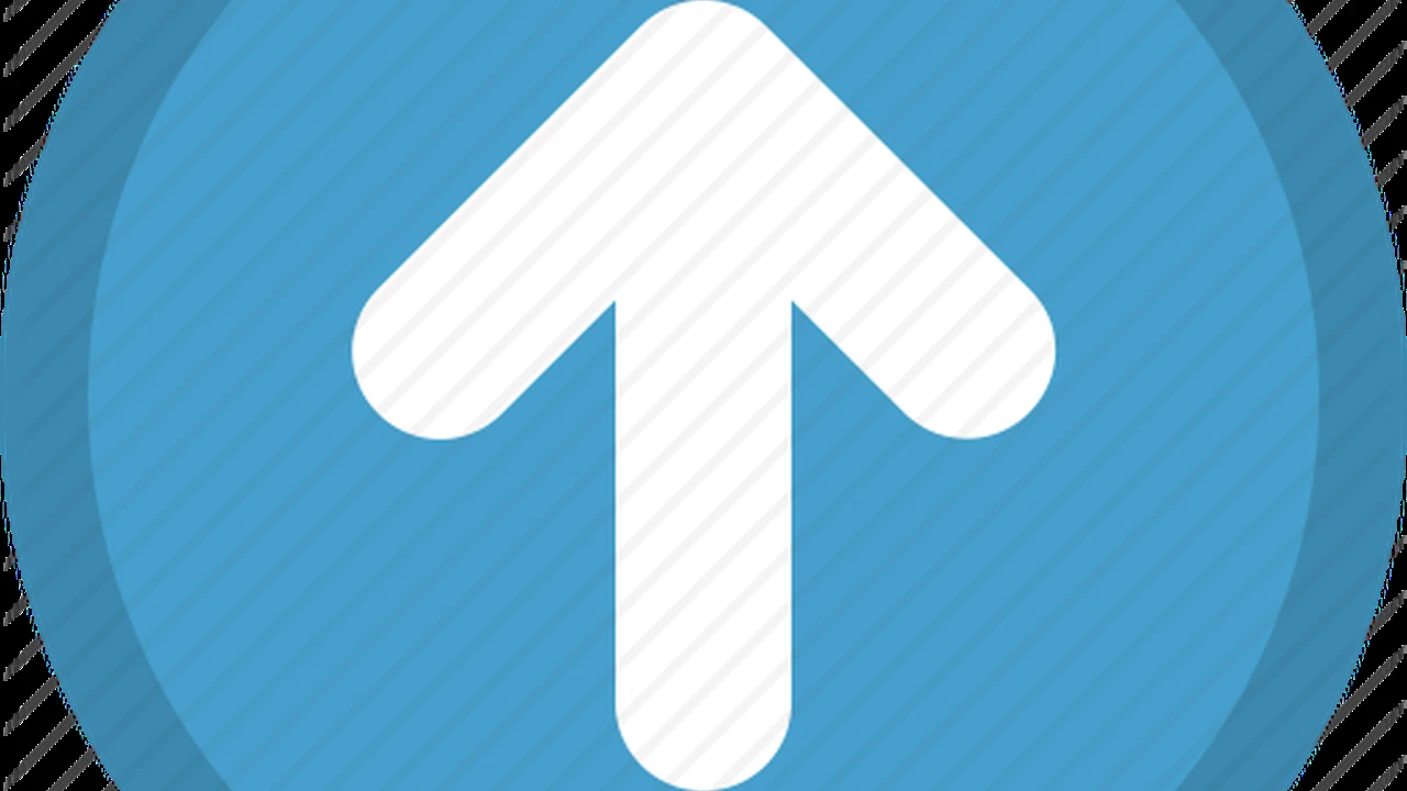 Close up on a plate of mashed potatoes, topped with baked pork chops with cream of mushroom soup, and a side of green beans.